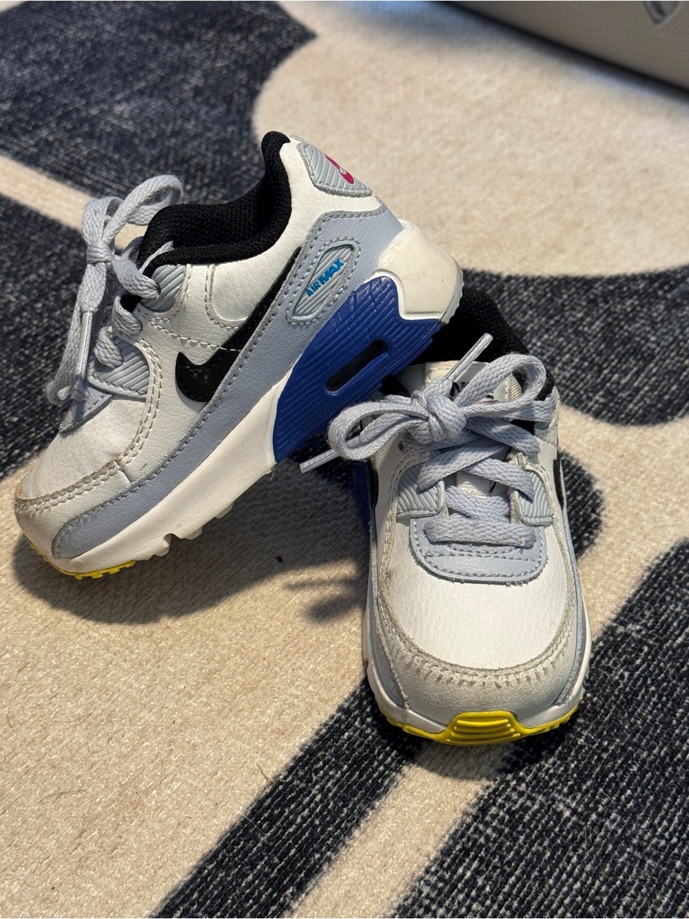 Nike Toddler White, Blue & Black Lightweight Sneakers with Yellow Accent